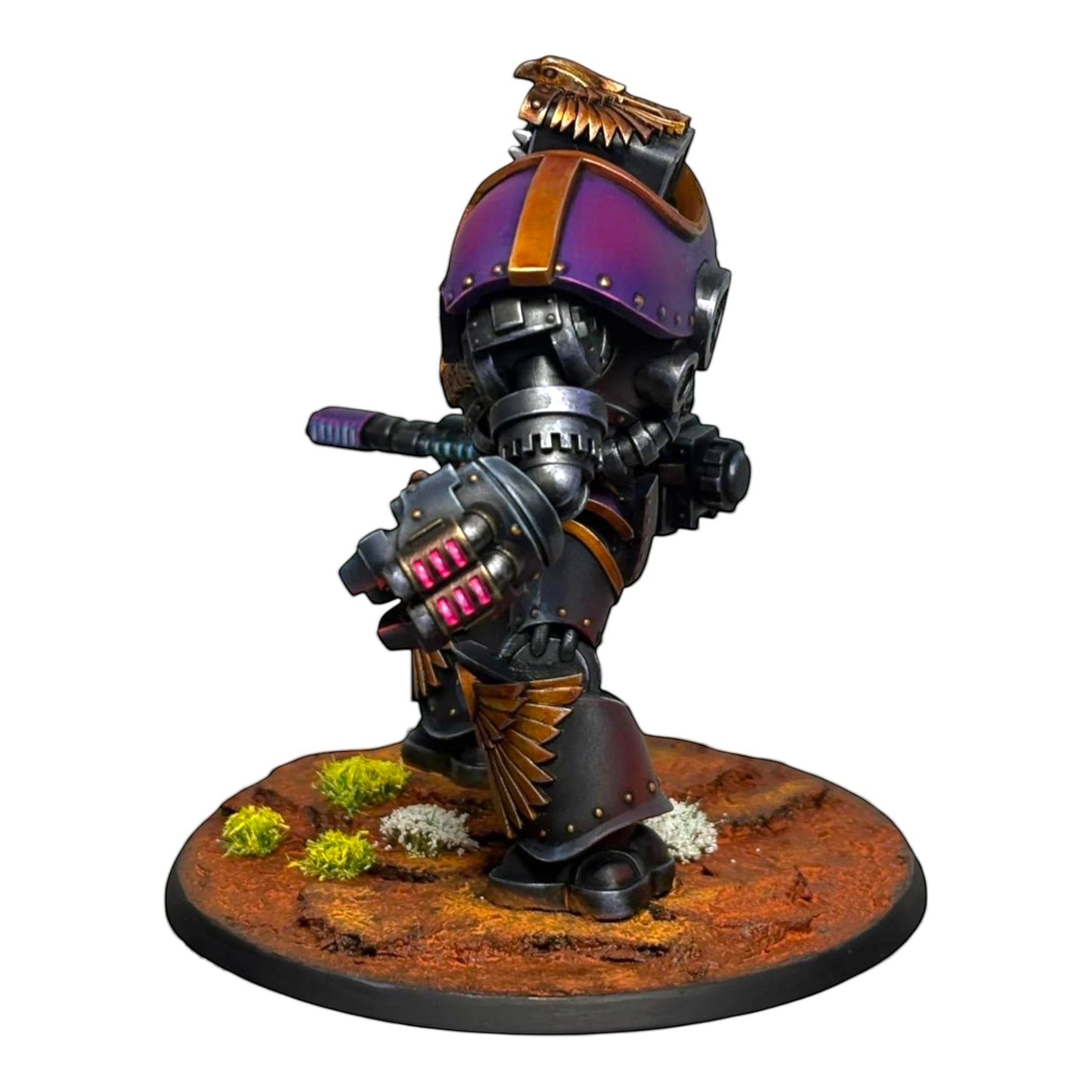CT Miniatures UK Altus Spaciator miniature with purple helmet, black armor, and gold accents. Includes fists and ranged weapons.