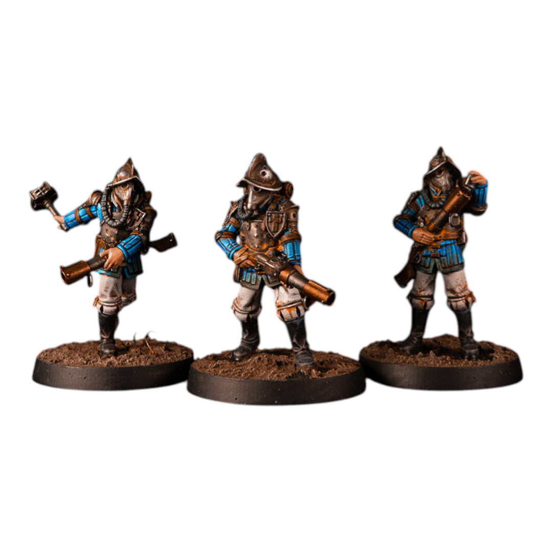 CT Miniatures UK Conquistador Bombers miniatures, 3x 33mm figures with guns and gas masks, wearing blue and white uniforms with armor.