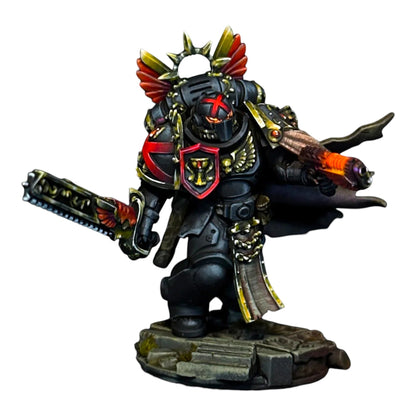 CT Miniatures UK Crimson Lords conversion set: black space marine with red and gold accents, holding a chainsword and plasma pistol.
