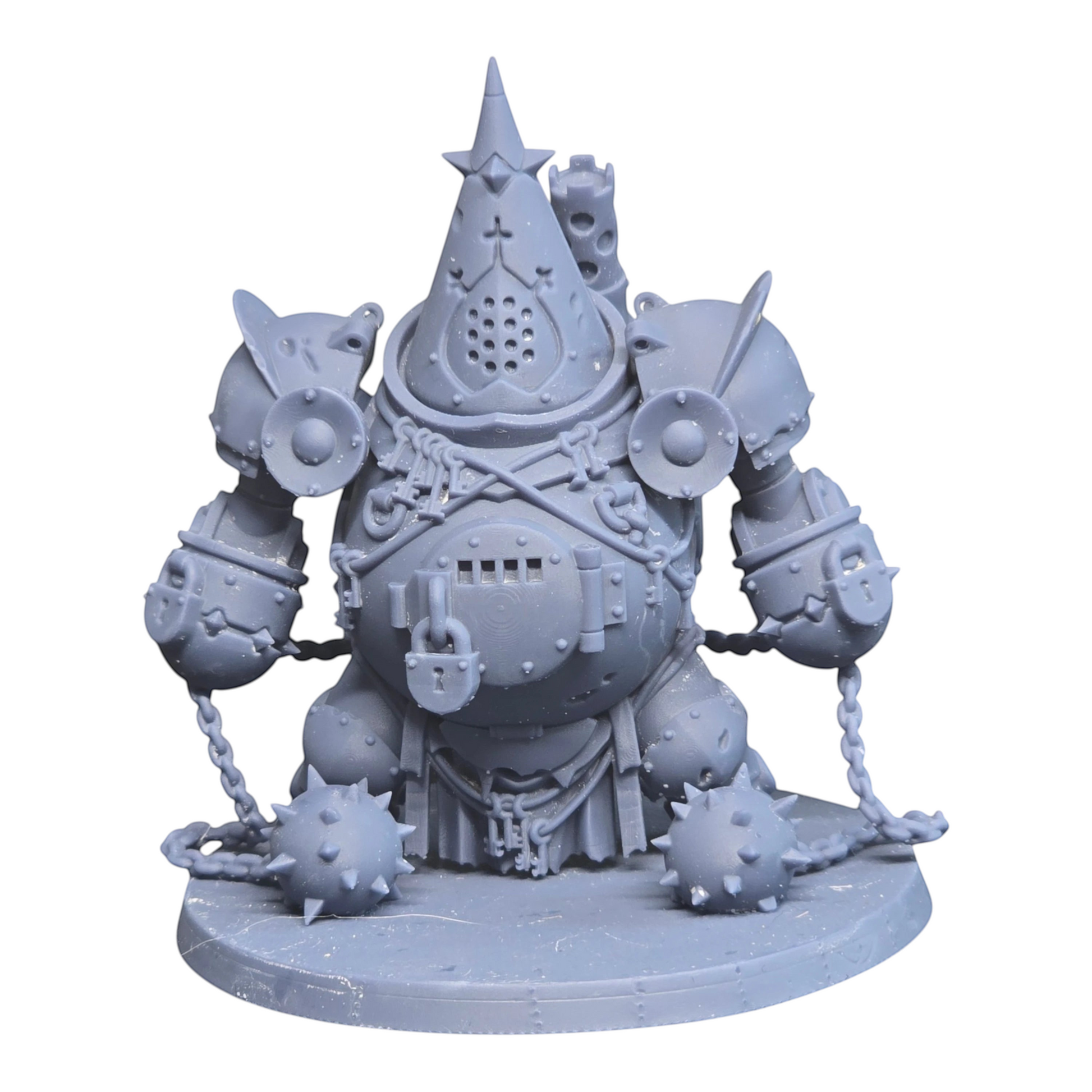 CT Miniatures UK Jaula de Castigo miniature: a grey resin, mechanical golem with spiked mace chains, a padlock, and a pointed helmet.