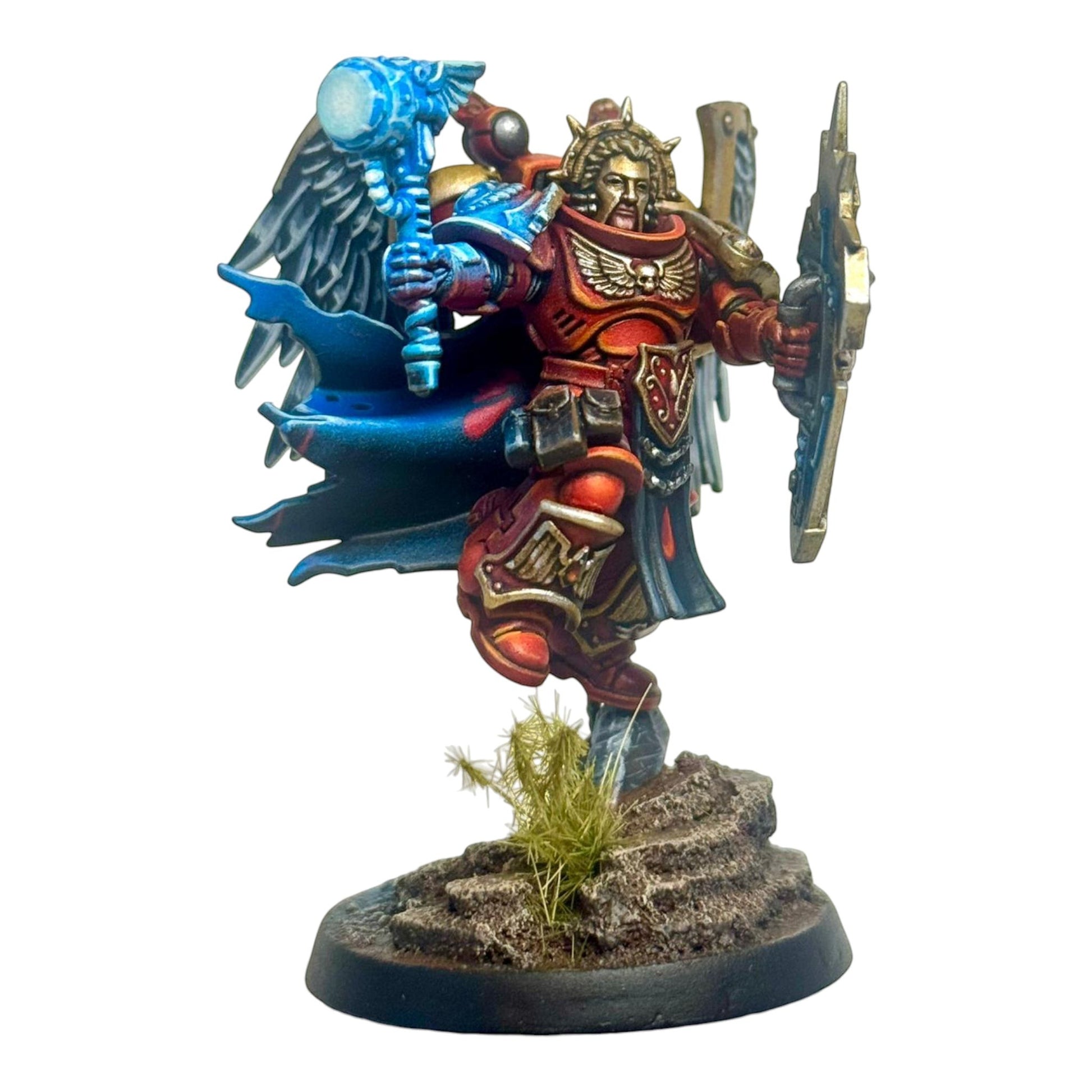 CT Miniatures UK CL Jetpack Captain miniature with ornate wings, jetpack, power hammer, storm shield, and custom armour. Red, blue, and gold.
