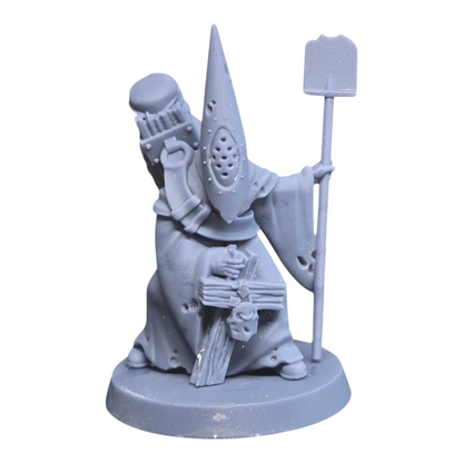 CT Miniatures UK Gravekeeper miniature, grey resin, hooded figure with shovel and skull cross.
