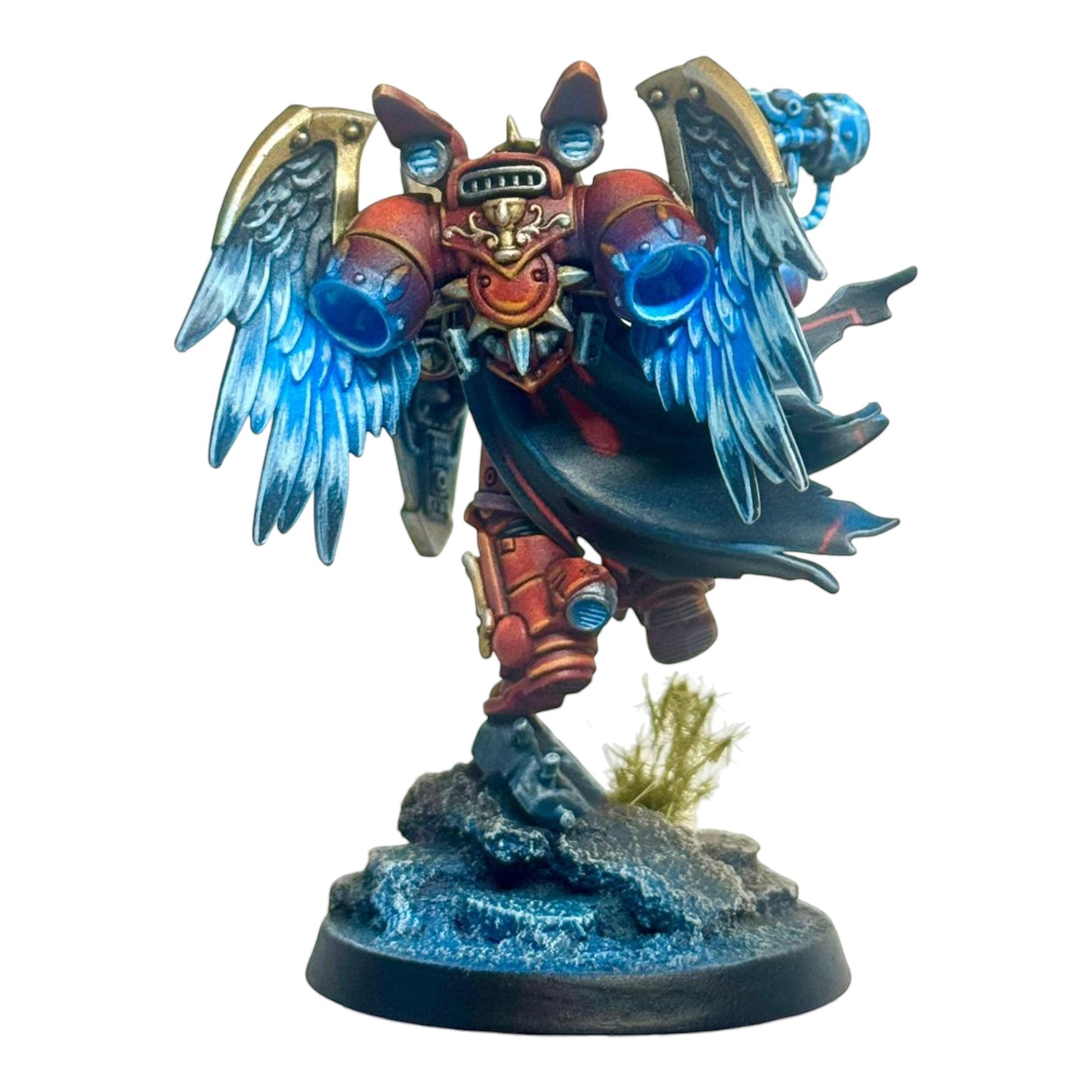 CT Miniatures UK red and gold space marine captain with feathered wings and jetpack, holding a hammer and shield.